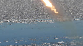 This picture taken on February 26, 2025 shows a strategic cruise missile during a drill by the Korean People's Army, on the coast of the "West Sea of Korea", or Yellow Sea, in North Korea.
