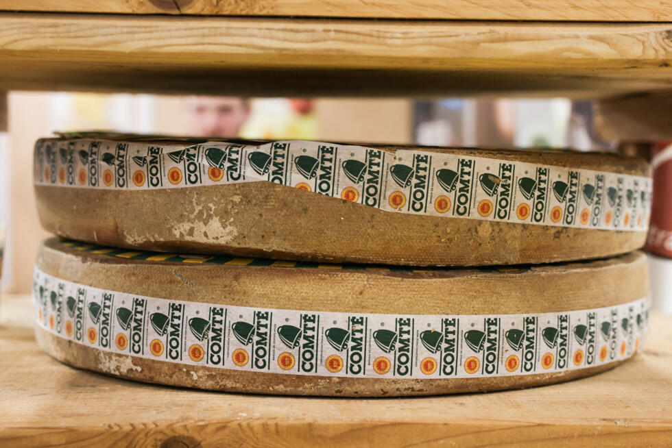 Comté cheese wheels at a producers' stand at the Salon International de l'Agriculture in Paris on February 24, 2025.