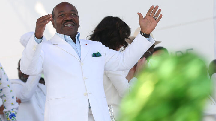 Ali Bongo Ondimba gestures during an event at the Nzang Ayong stadium in Libreville, Gabon, on July 10, 2023.
