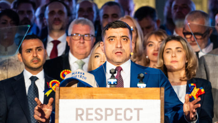 Romania's George Simion speaks to supporters in Bucharest after the second round of the presidential election on May 18, 2025.
