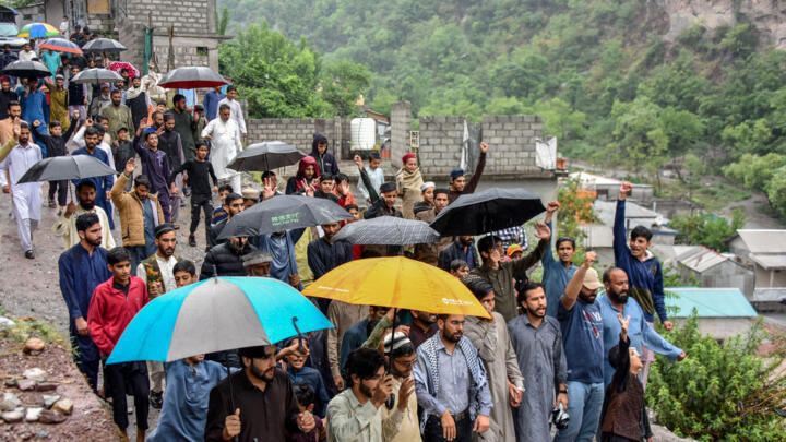 Kashmiri Muslims shout anti-Indian slogans after offering Friday prayers following Indian strikes in Muzaffarabad, the capital of Pakistan-administered Kashmir