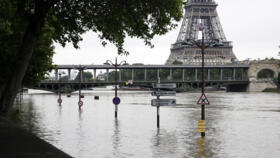 The flooded banks of the Seine photographed in front of the Eiffel Tower in Paris on June 3, 2016.