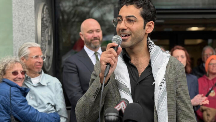 Mohsen Mahdawi speaks outside the courthouse after a judge released the Palestinian student activist on Wednesday, April 30, 2025 in Burlington, Vt.