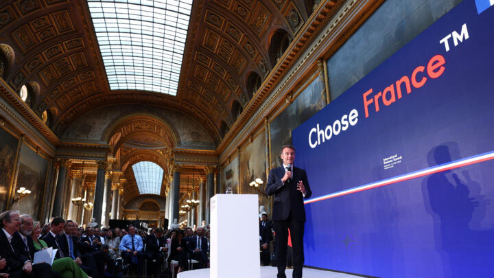 French President Emmanuel Macron speaks at the "Choose France Summit", aiming to attract foreign investors to the country, at the Chateau de Versailles, on May 19, 2025.  