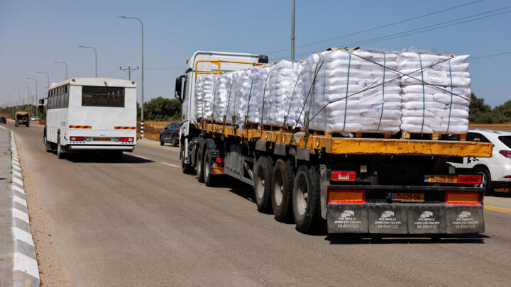 A view of an aid truck entering from Israel into Gaza, on the road to the Kerem Shalom crossing near the Israeli-Gaza border, May 21, 2025. 
